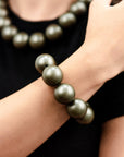 Bracciale elastico con balls di colore verde - Mya Accessories