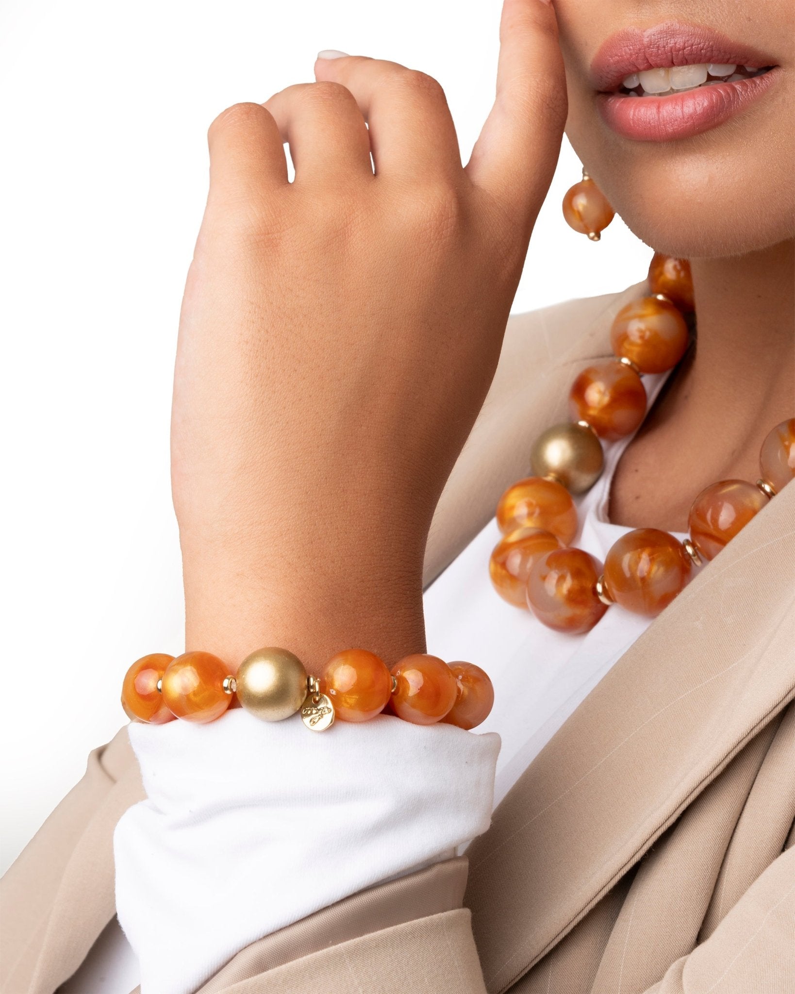 Bracciale elastico con sfere dalle nuances arancio - Mya Accessories