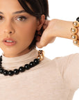 Bracciale elastico con sfere nere ed oro - Mya Accessories