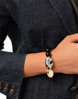 Bracciale elastico con pietre in acrilico nero ed inserti animalier - Mya Accessories