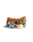 Bracciale elastico a tre linee con sfere in acrilico e vetro tono marrone - Mya Accessories