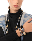 Bracciale elastico a tre linee con sfere in acrilico e vetro tono nero - Mya Accessories