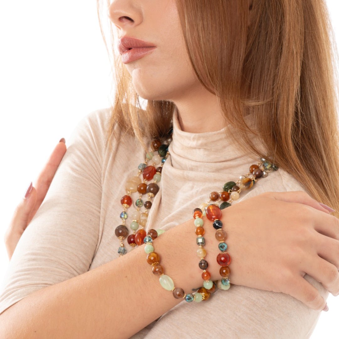 Bracciale elastico a tre linee con pietre in acrilico e vetro multi arancio - Mya Accessories