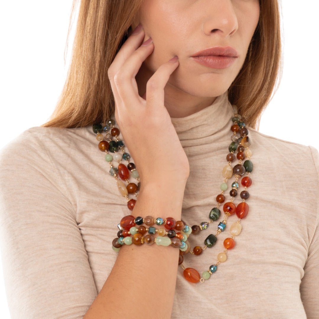 Bracciale elastico a tre linee con pietre in acrilico e vetro multi arancio - Mya Accessories