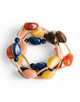 Bracciale elastico a quattro fili con inserti in metallo e pietre in acrilico multicolore - Mya Accessories
