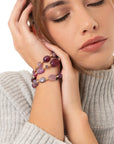 Bracciale elastico a tre linee con pietre in vetro ed acrilico tono viola - Mya Accessories