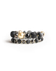 Bracciale elastico a due linee con sfere in resina, acrilico e vetro tono nero - Mya Accessories
