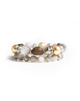 Bracciale elastico a due linee con sfere in resina, acrilico e vetro tono grigio - Mya Accessories