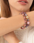 Bracciale elastico a due linee con sfere in resina, acrilico e vetro tono rosa - Mya Accessories