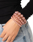 Bracciale elastico multilinee con pietre in resina rosa - Mya Accessories