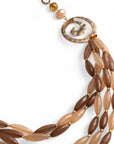 Collana a catena multilinee in acrilico tono beige, con inserti di spirale in metallo - Mya Accessories
