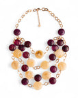Collana a catena con cascata di pietre schiacciate in acrilico beige e viola - Mya Accessories