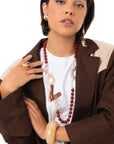 Collana lunga con sfere marroni ed inserti in acrilico con scritta love - Mya Accessories