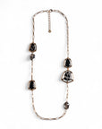 Collana lunga a catena con inserti geometrici in acrilico animalier tono nero - Mya Accessories