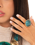 Anello in metallo elastico, con pietra circolare in resina turchese - Mya Accessories