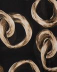 Sciarpa in cotone nera con stampa ad anelli beige - Mya Accessories
