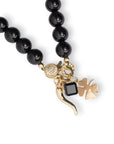 Collana girocollo con pietre in vetro nere e charms pendenti in metallo - Mya Accessories