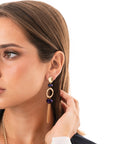 Orecchini pendenti con pietra in vetro viola e frange a catena - Mya Accessories