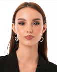 Orecchini a cerchio con pendente asimmetrico smaltato bianco e nero - Mya Accessories