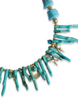 Collana girocollo con rami pendenti in acrilico turchese con inserto stella marina e charms in metallo - Mya Accessories