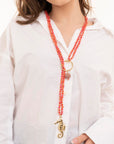 Collana sali e scendi con micro cristalli corallo e pendente a cavalluccio marino in metallo - Mya Accessories