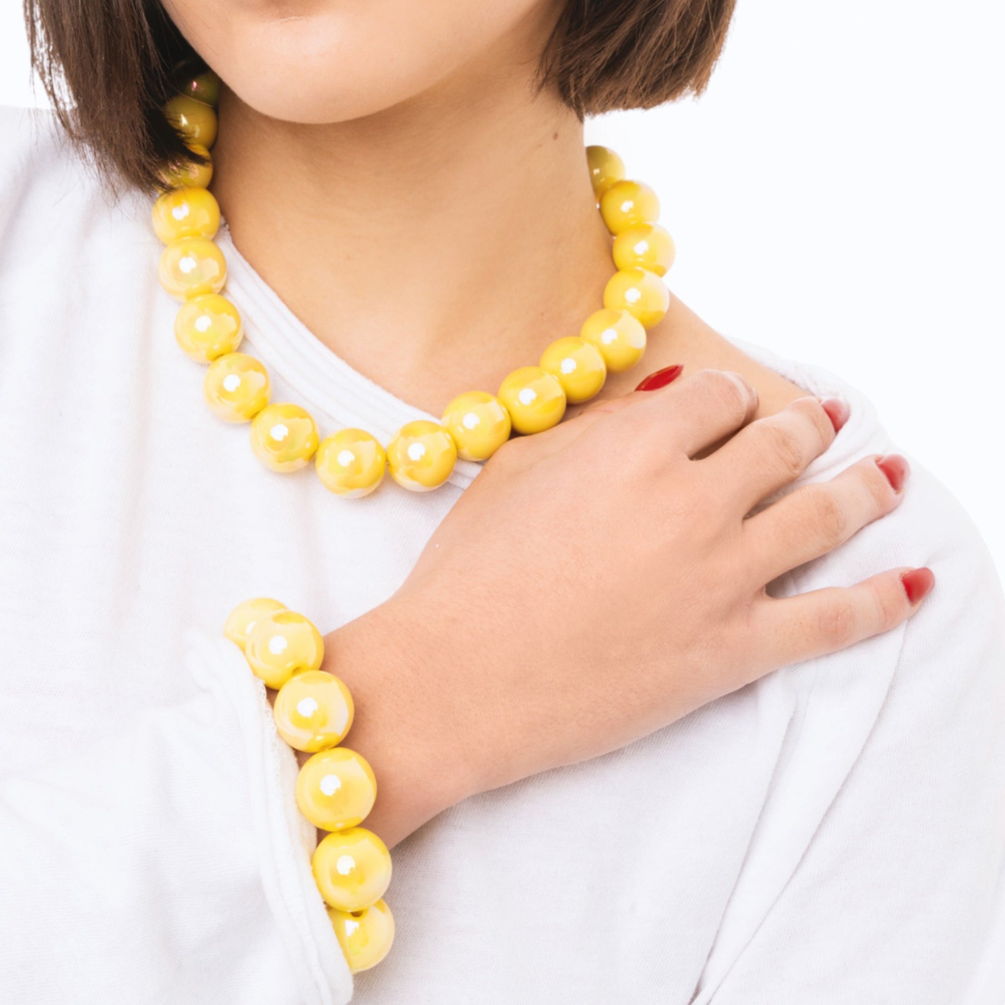 Bracciale elastico con sfere lucide in acrilico gialle - Mya Accessories