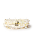 Bracciale elastico multi filo con pietre in vetro e conchiglie gialle - Mya Accessories