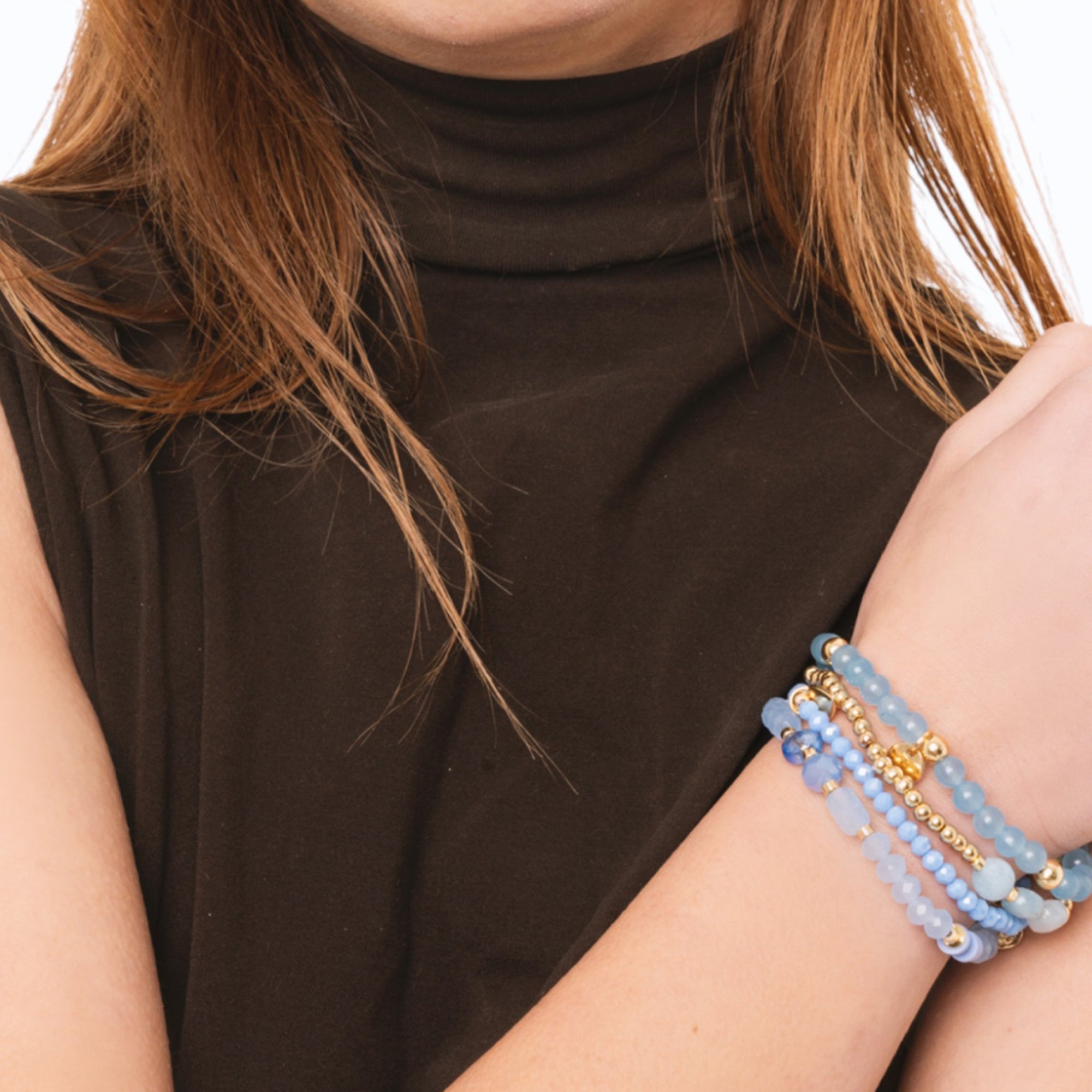 Bracciale elastico multi filo con pietre dure tono celeste - Mya Accessories