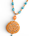 Collana lunga con pietre in acrilico e vetro, pendente mandala arancio - Mya Accessories