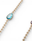 Collana lunga con perle in acrilico ed inserti in resina viola e blu - Mya Accessories