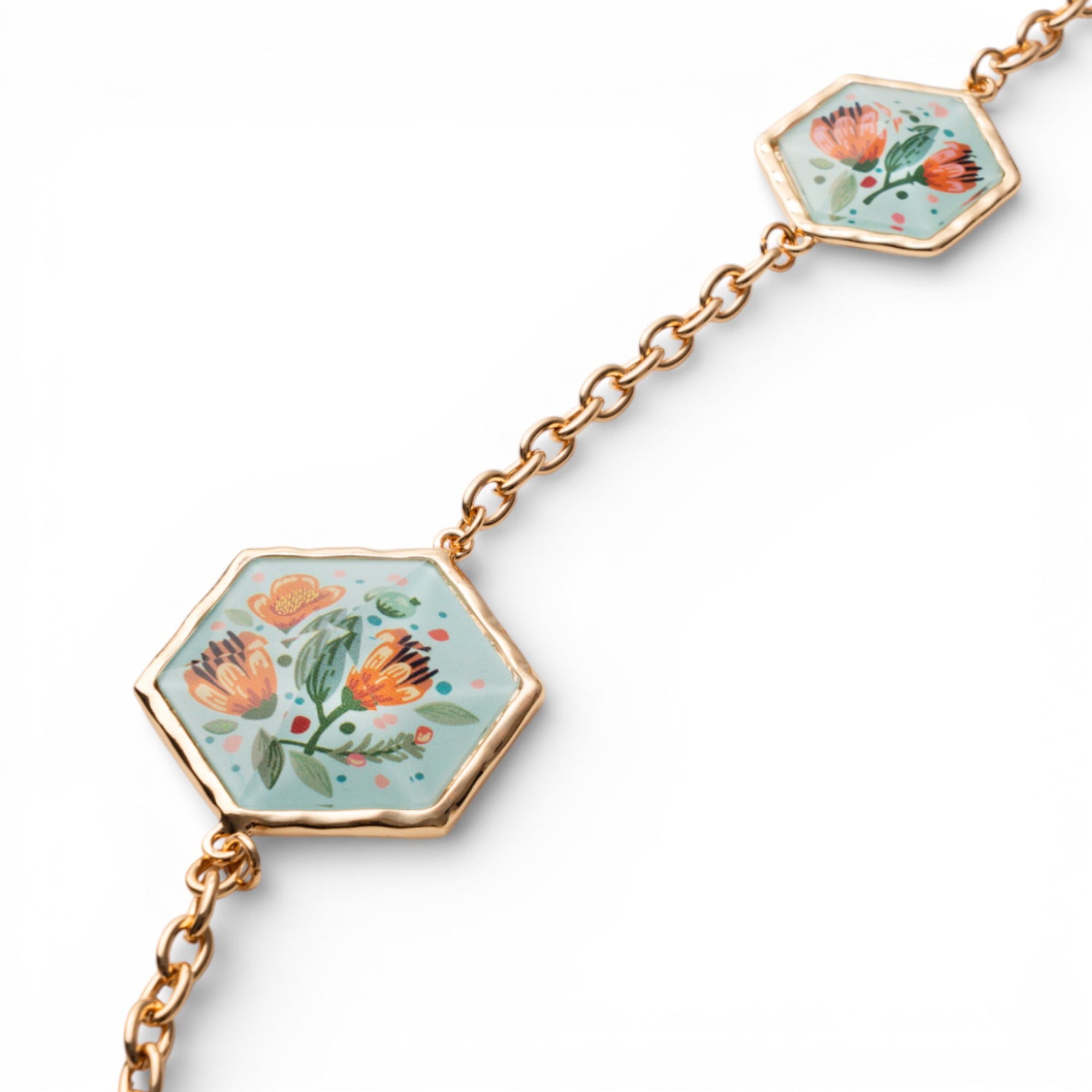 Collana lunga a catena con inserti esagonali in resina celeste design floreale - Mya Accessories