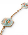 Collana lunga a catena con inserti esagonali in resina celeste design floreale - Mya Accessories