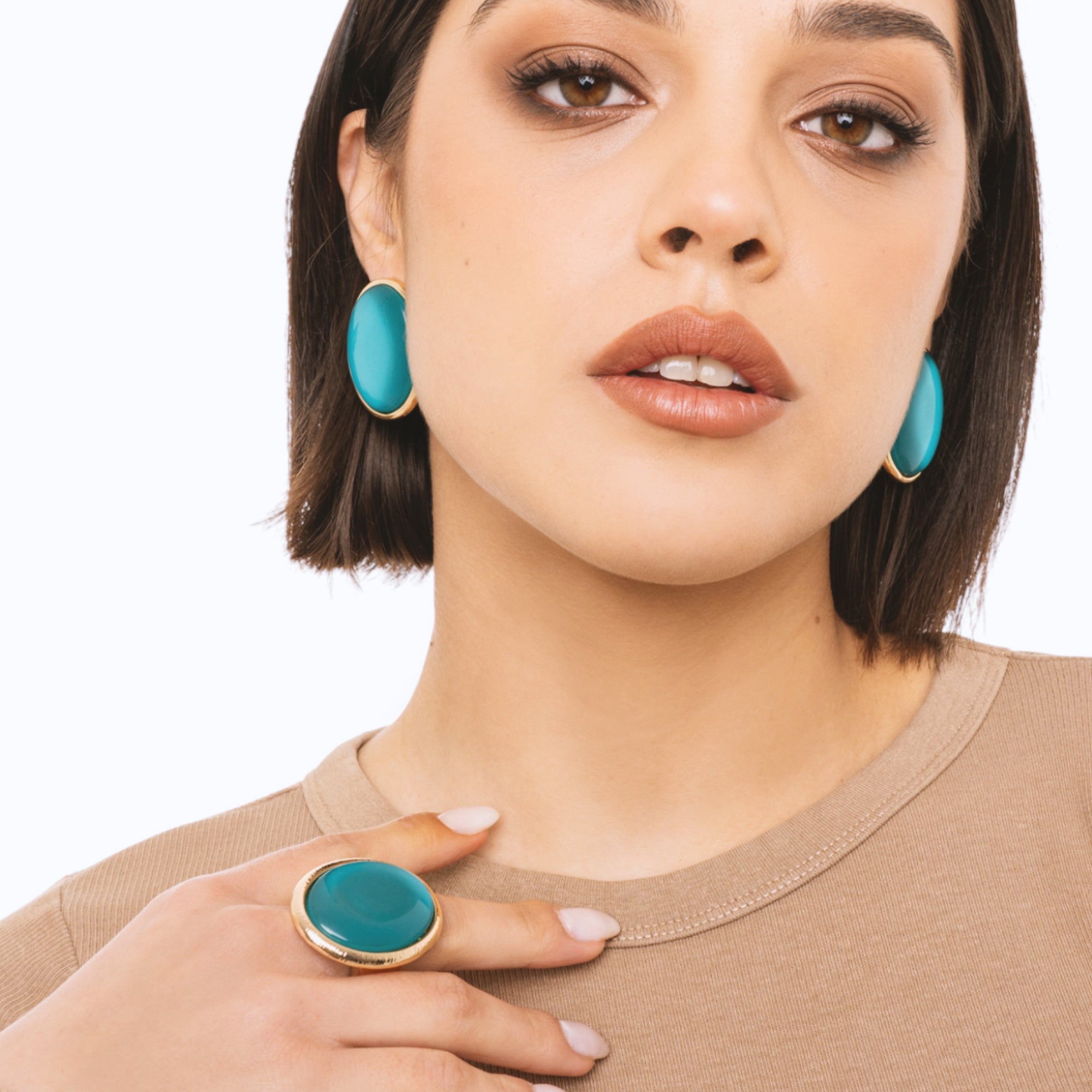 Anello elastico in metallo con pietra in resina ovale turchese - Mya Accessories