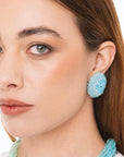 Orecchini a clip ovali con microcristalli in vetro azzurri - Mya Accessories