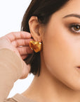 Orecchini con design a cuore in acciaio lucido - Mya Accessories