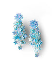 Orecchini pendenti a cascata di fiorellini tono azzurro - Mya Accessories