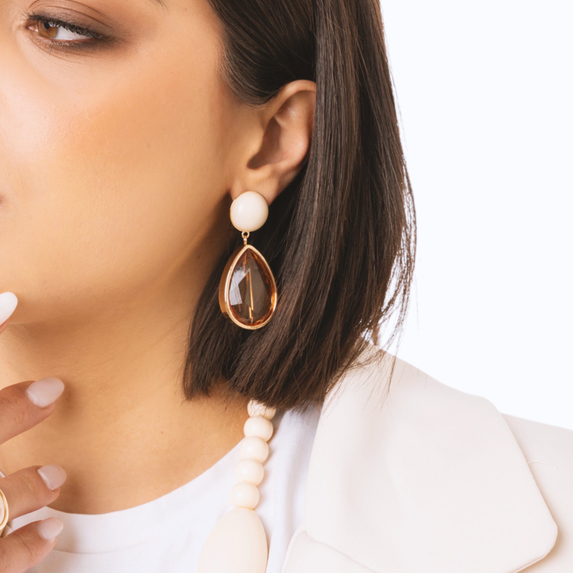Orecchini pendenti con pietra a goccia in acrilico trasparente arancio - Mya Accessories