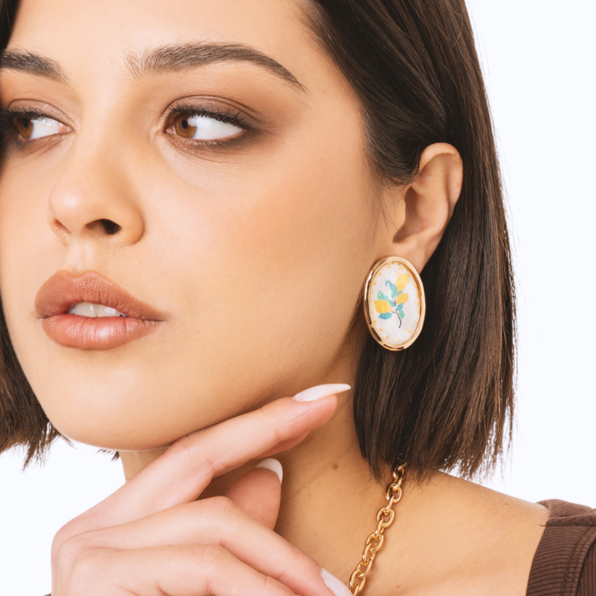Orecchini a clip a pietra ovale con motivo pianta di limone in resina - Mya Accessories