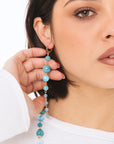 Orecchini pendenti lunghi con pietre dure a sfera turchesi - Mya Accessories