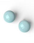Orecchini a clip con pietra circolare in resina celeste - Mya Accessories