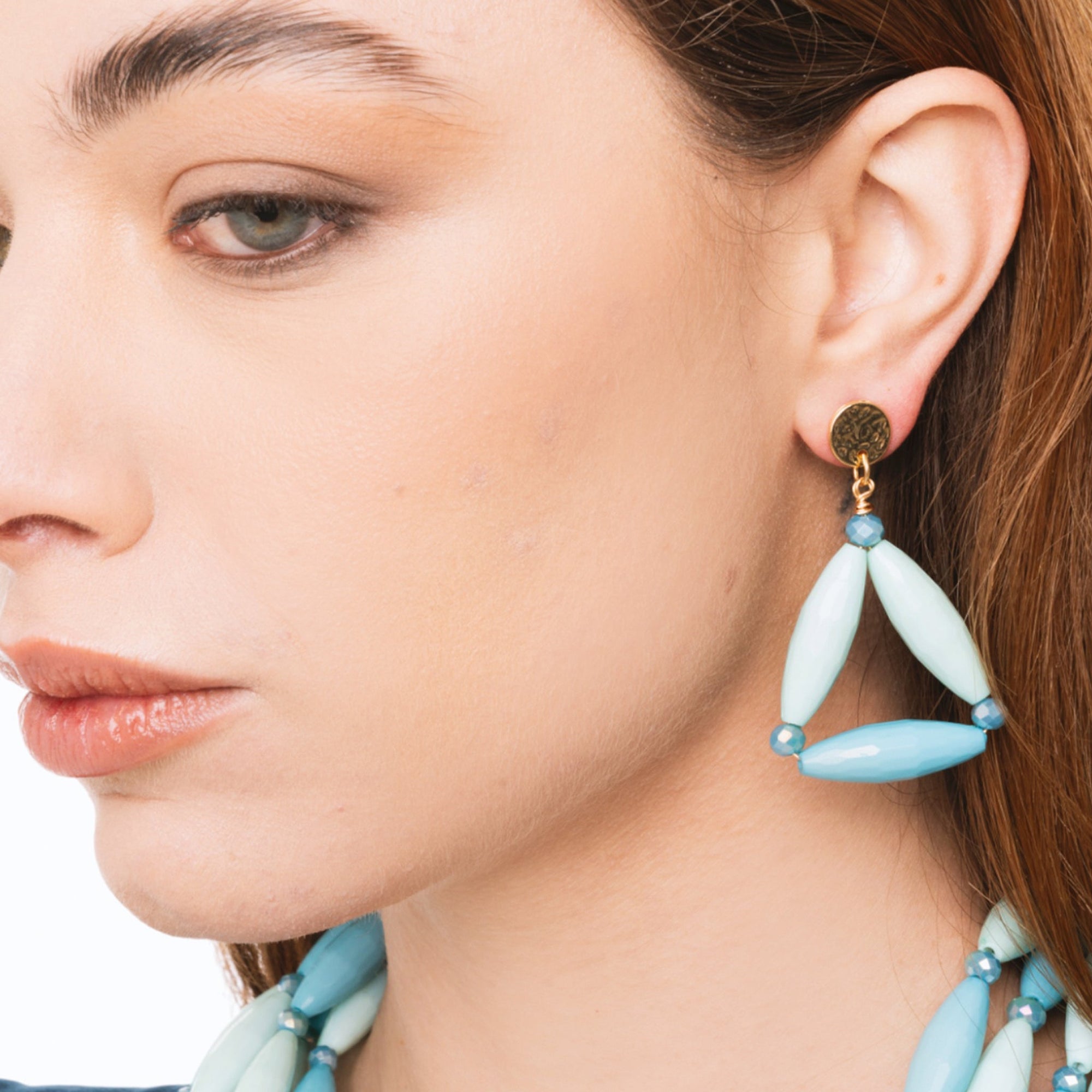 Orecchini pendenti con design triangolare tono azzurro - Mya Accessories