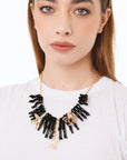 Collana girocollo con rami di corallo neri in acrilico ed elementi marini in metallo pendenti - Mya Accessories