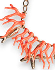 Collana girocollo con rami di corallo arancio in acrilico ed elementi marini in metallo pendenti - Mya Accessories