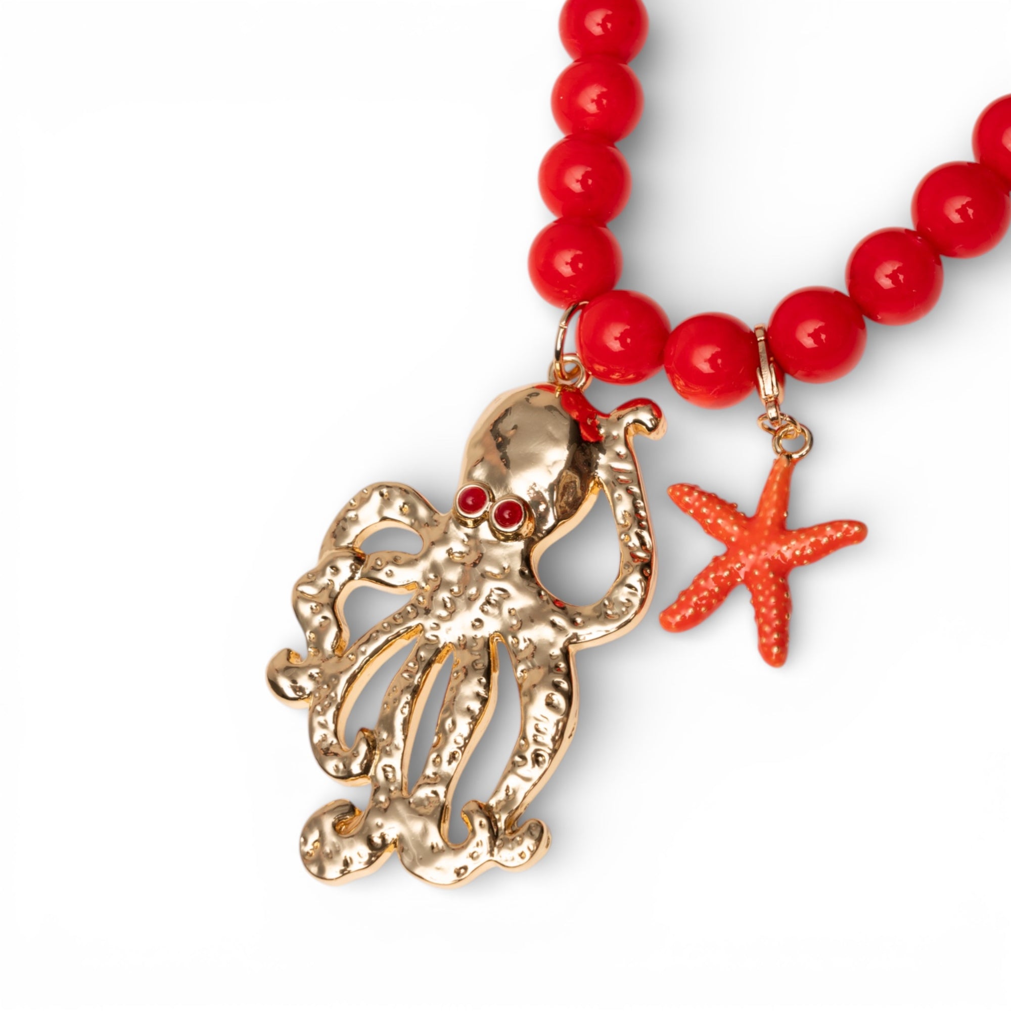 Collana lunga con sfere rosse in acrilico e pendente polipetto in metallo - Mya Accessories