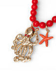 Collana lunga con sfere rosse in acrilico e pendente polipetto in metallo - Mya Accessories