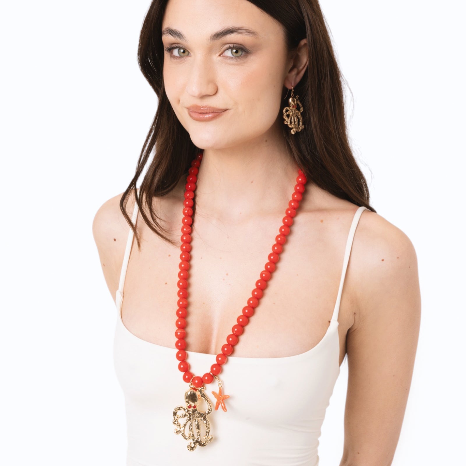 Collana lunga con sfere rosse in acrilico e pendente polipetto in metallo - Mya Accessories