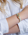 Bracciale in ottone a serpente smaltato verde acqua con zirconi - Mya Accessories