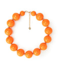 Collana girocollo in acrilico XXL arancio con rondelle in ottone - Mya Accessories